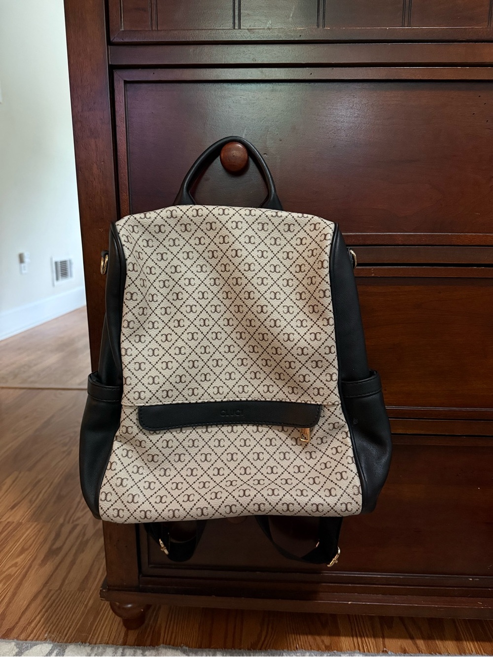 Monogram Canvas Backpack with Black Leather Trim